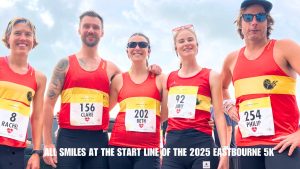 Lewes AC all smiles on the start line of the 2025 Eastbourne 5k