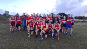 LAC members line up after completing the 2025 Masters Mantell