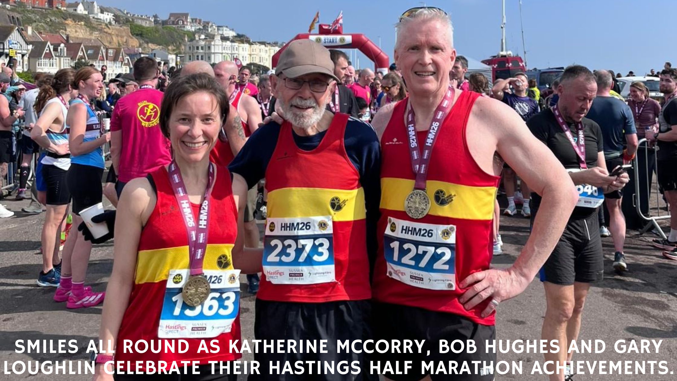 Smiles all round as Lewes AC's Katherine McCorry, Bob Hughes and Gary Loughlin celebrate their Hastings Half Marathon achievements.