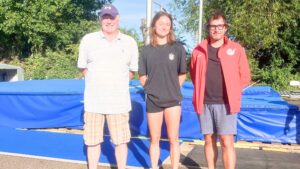 Rick Pilling, founder and lead coach of the Sussex Pole Vault Group at Lewes Athletic Club, British Pole Vault Champion Gemma Tutton, and Lewes Athletic Clun Chair Philip Westbury